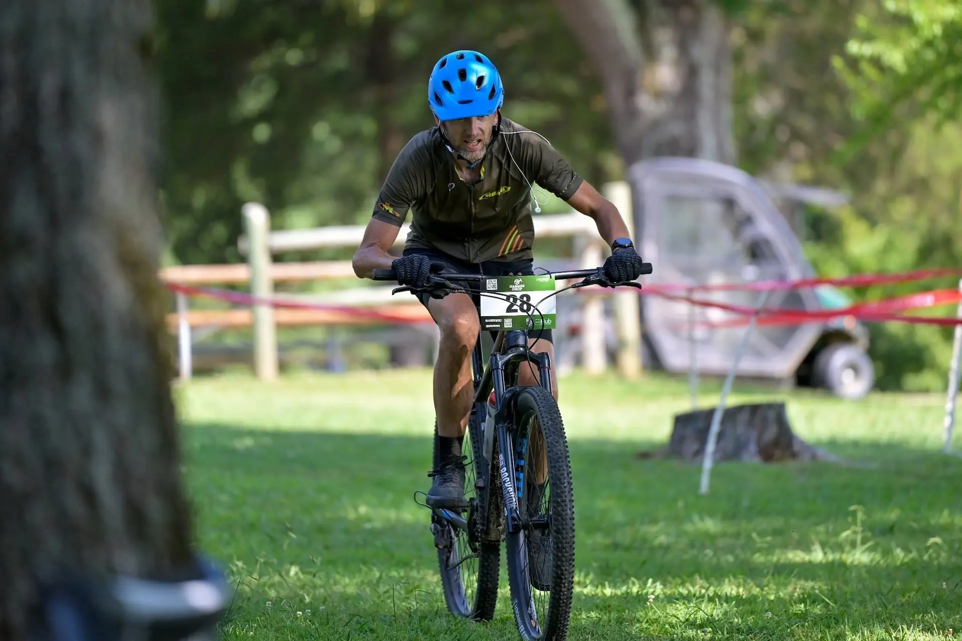 A mountain biker on a wooded trail
